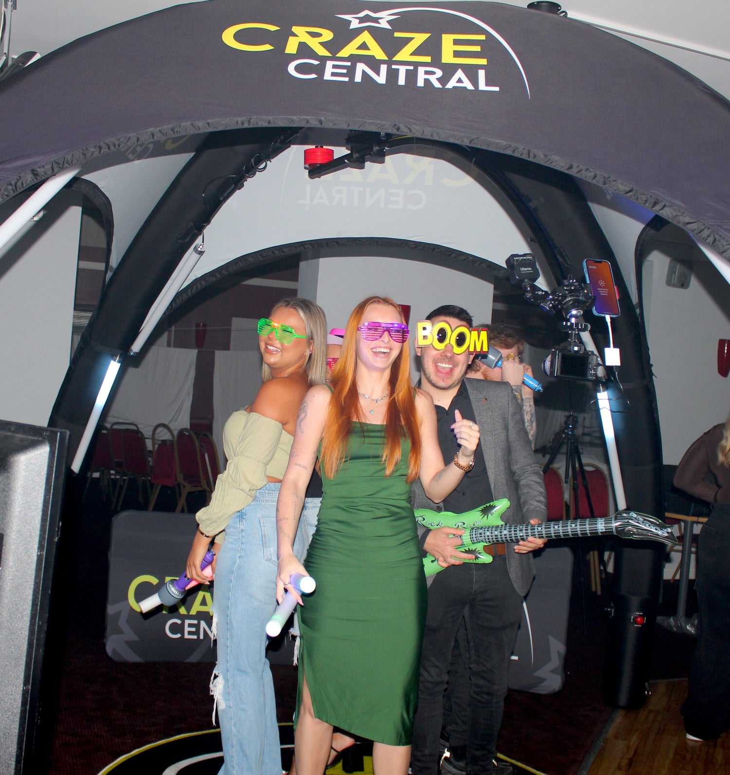 People in 360 Orb Air photo booth hired from Craze Central in Newcastle