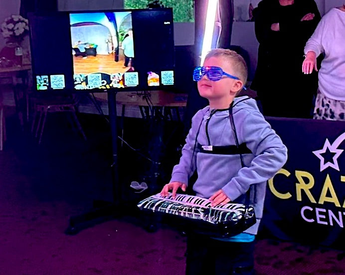 Young boy in our 360 Orb Air video booth in Gateshead