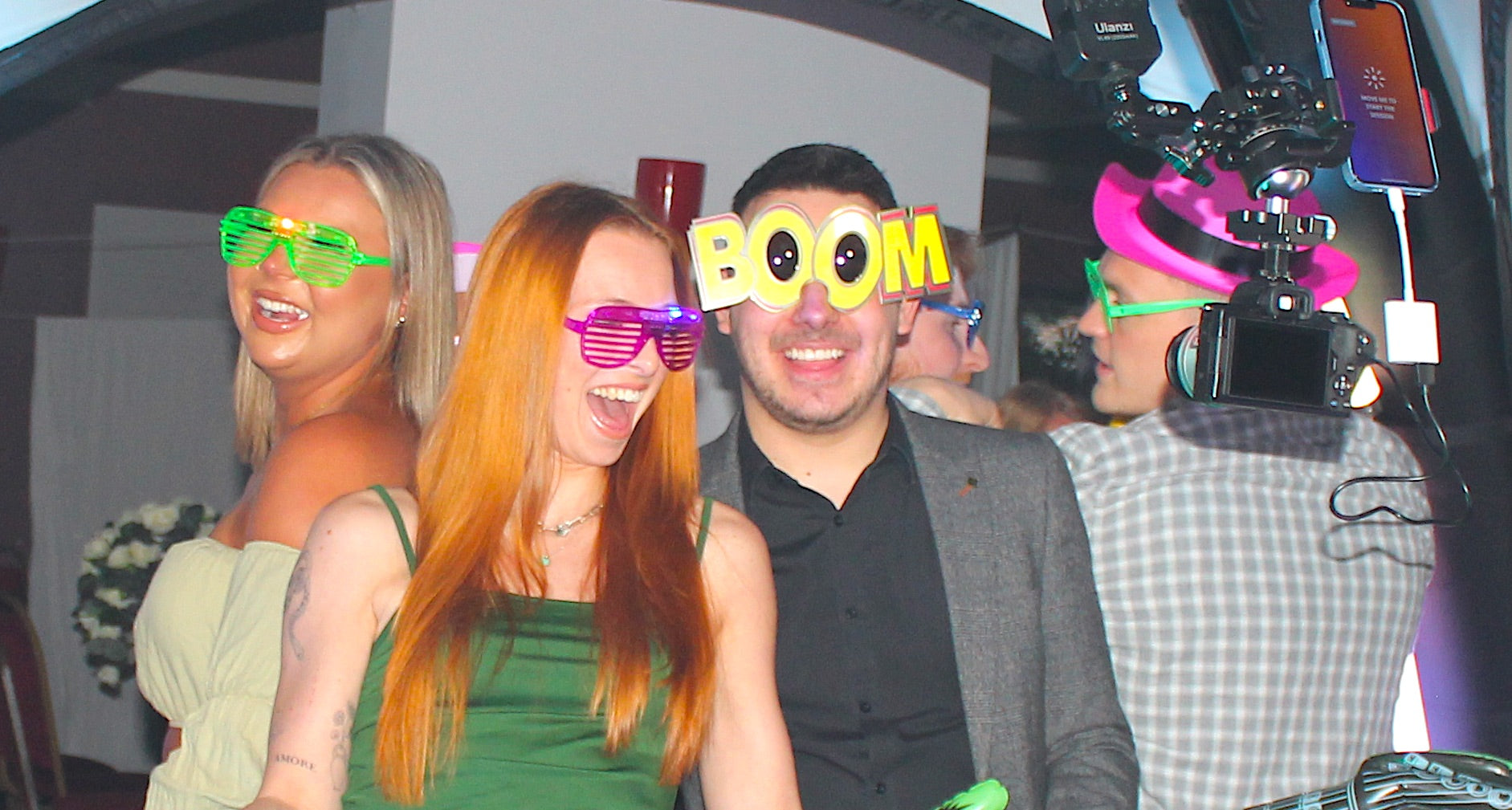 People at a wedding in a hired 360 photo booth in Northumberland